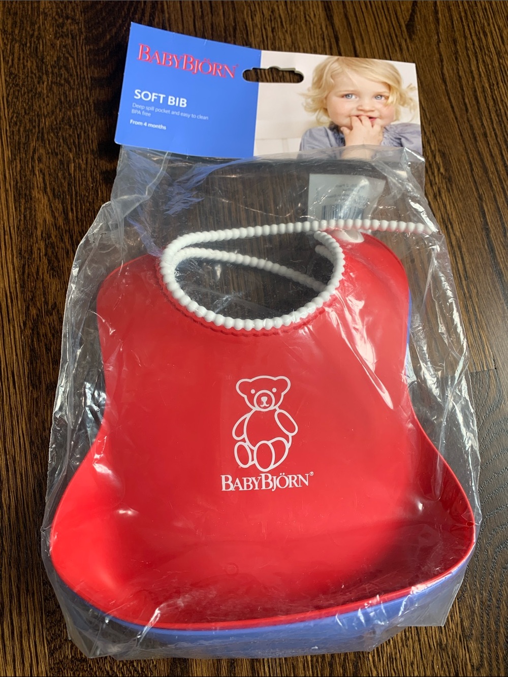 BabyBjörn Red Soft Bib with White Trim and Catch Pocket